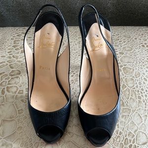 Black leather sling backs